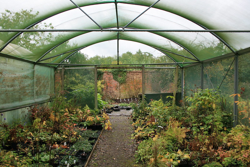 a planter covered by a shade cloth