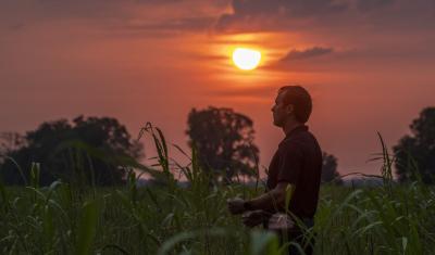 Sunrise and clouds greet Charlie Roberts, owner of Roberts Farms