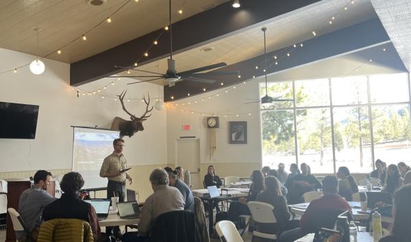 Aaron Mayville, Coconino National Forest Forest Supervisor speaking to workshop participants 