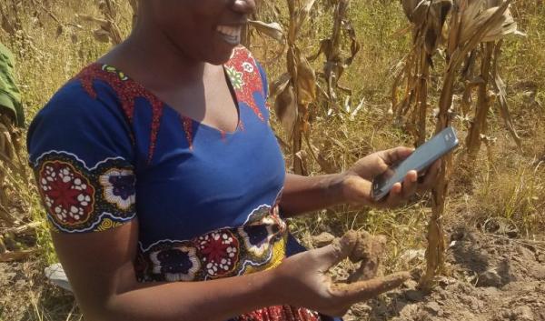 Ag Extension Agent in Tanzania learning how to use LandPKS