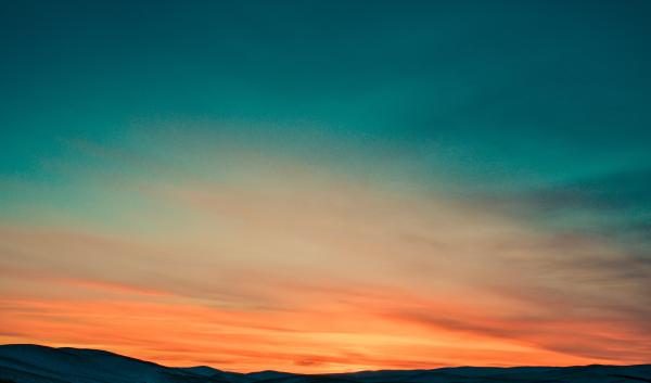 Sunset over Snow covered mountains